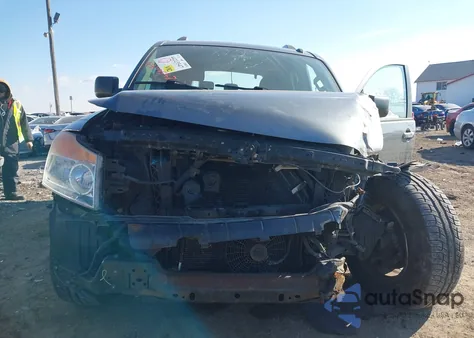 2015 Nissan Armada Platinum/Sl/Sv z USA, uszkodzony, nr VIN 5N1AA0NC5FN611461